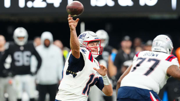 Mac Jones throws the ball